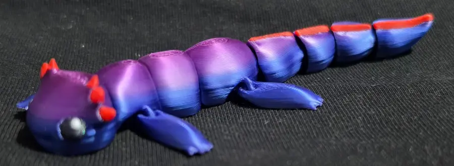 Axolotl, purple and red, side view