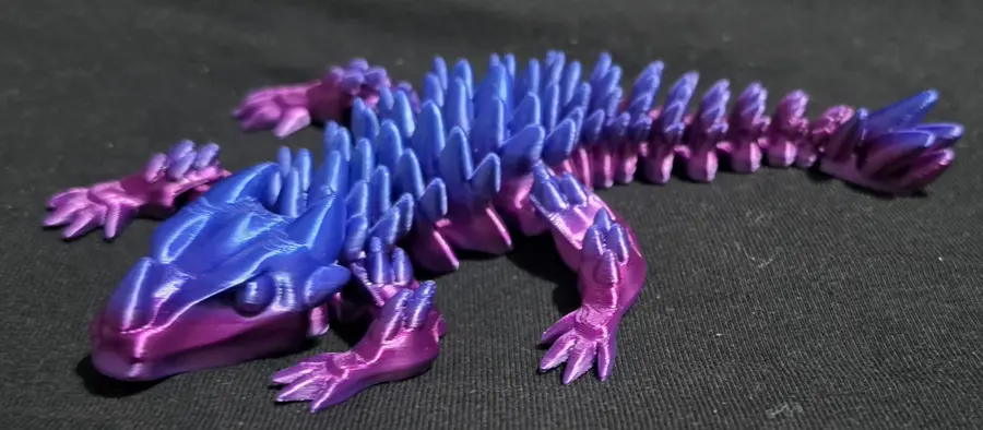 Articulated dragon, purple/blue, close up