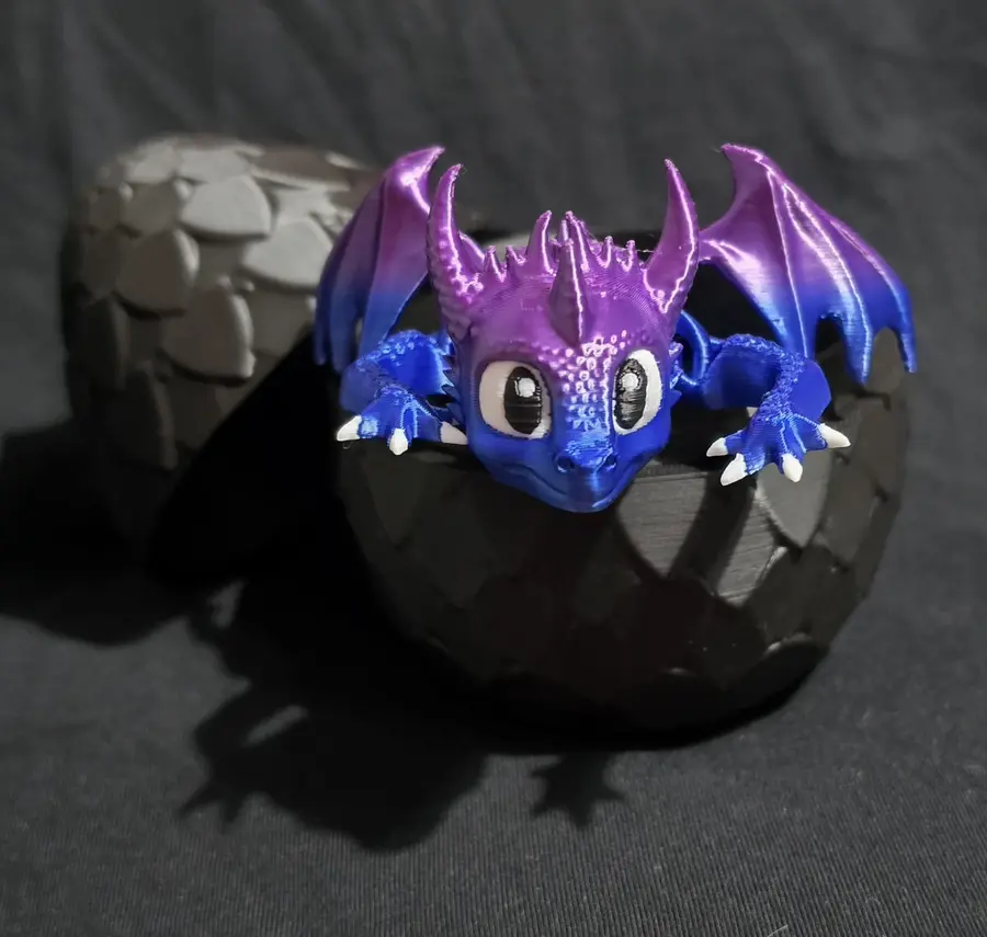 Dragon egg with dragon inside - blue metallic egg