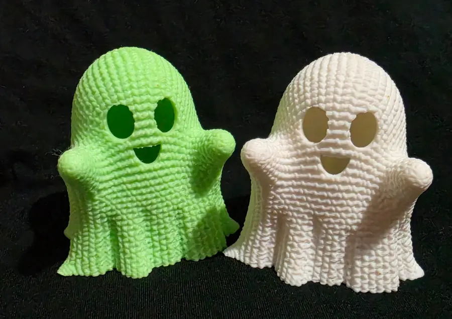 Green glow ghost next to white ghost