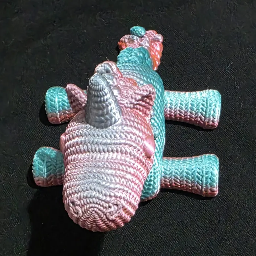 Unicorn, pink to teal shimmer, top view